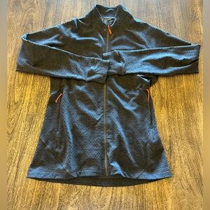 Rab lightweight zippered layering jacket.